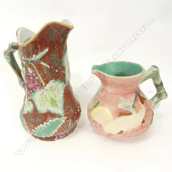 2 ANTIQUE  RELIEF MOULDED JUGS