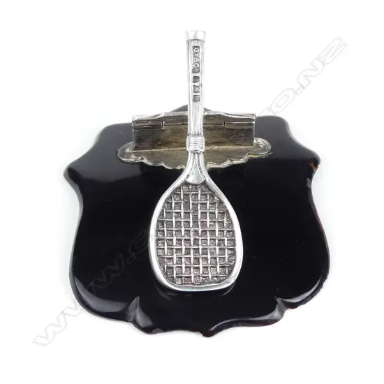 An Edwardian novelty silver tennis racquet and tortoiseshell paper clip