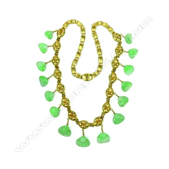 An impressive 14ct. gold and jade necklace