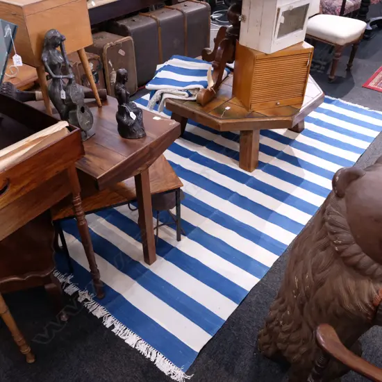 TWO WHITE AND BLUE STRIPED RUGS