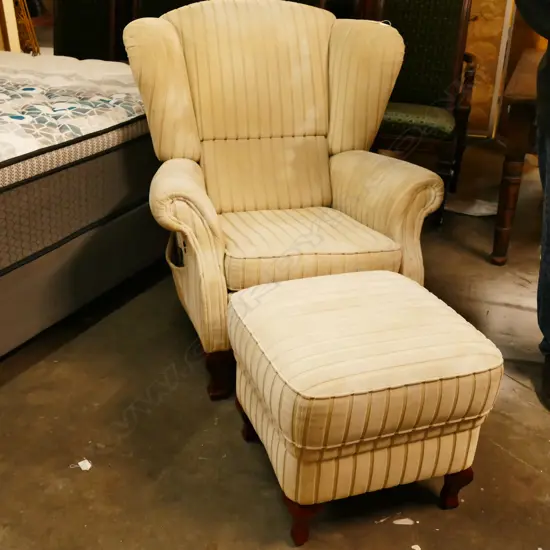 UPHOLSTERED WING BACK ARMCHAIR AND STOOL