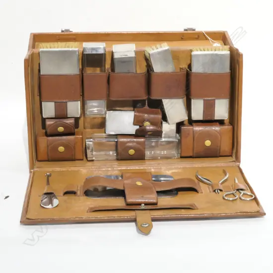STERLING TOPPED TRAVELLING SET IN LEATHER CASE