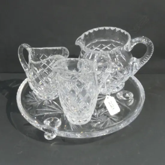 3 CRYSTAL JUGS ON A CRYSTAL TRAY