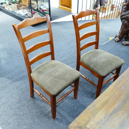 SIX LADDER BACK CHAIRS