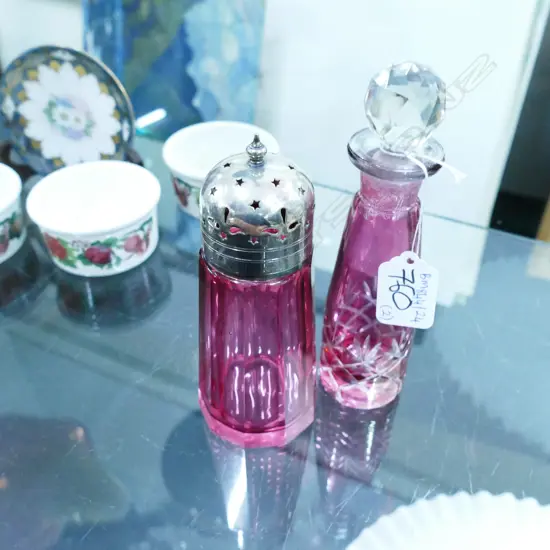 TWO RUBY GLASS VESTLES