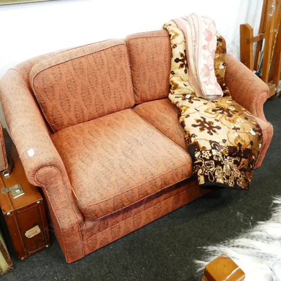 RED 2 SEATER COUCH ROLL ARM