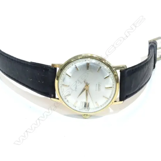 gold plated 34mm case; stainless steel back marked 'Waterproof' (engraved previous owner's name); champagne dial with gold batons indicating hours; Dauphine hands