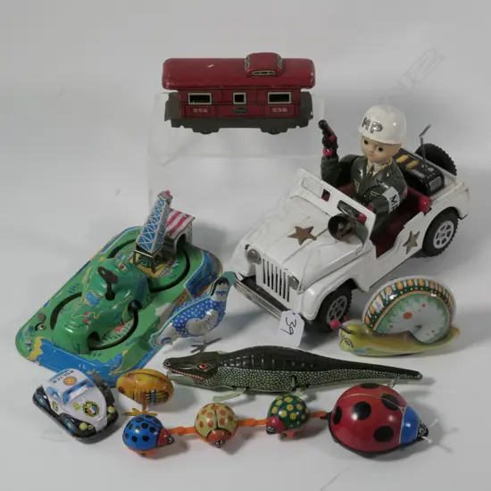 9 VINTAGE JAPANESE TINPLATE TOYS....