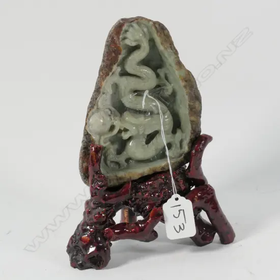 CARVED JADE DRAGON ON STAND 