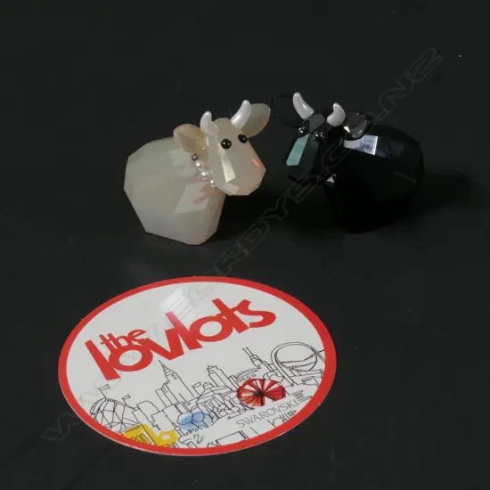 SWAROVSKI BOXED BLACK AND WHITE COWS H 50 MM