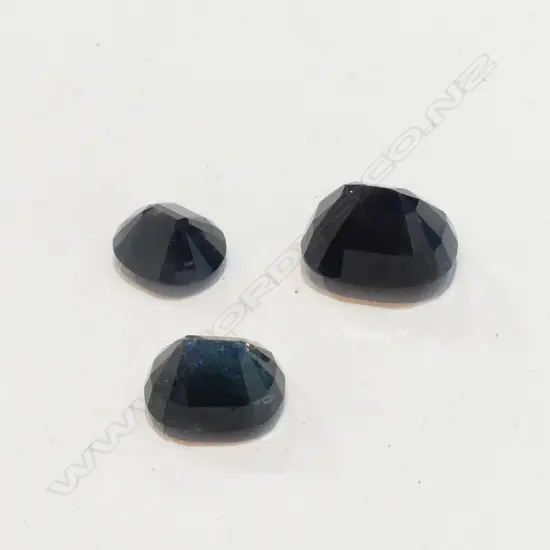 THREE DARK BLUE SAPPHIRES TOTAL OF 15CT