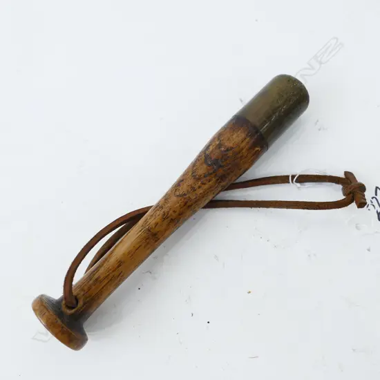 A 6 1/2'' TURNED WOODEN 'PRIEST' MADE BY W. H. TISDALLS LTD