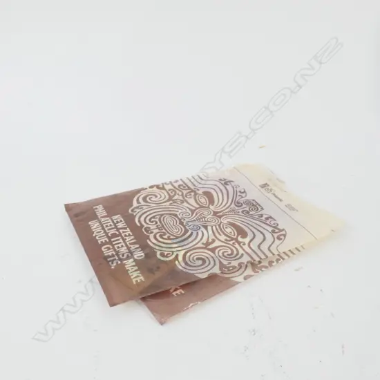 TWO PACKETS OF NZ STAMPS