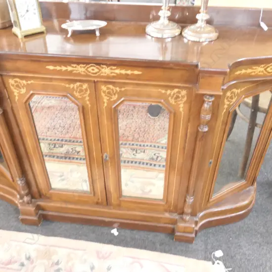 An inlaid mahogany and walnut credenza