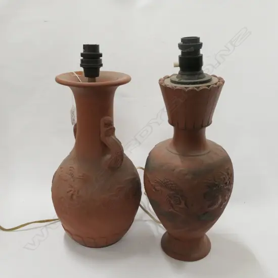 2 JAPANESE TERRACOTA DRAGON LAMPS. H. 310MM