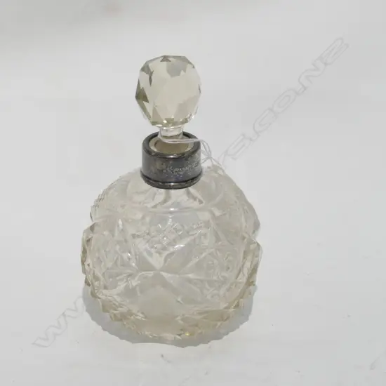 CUT CRYSTAL AND SILVER TOPPED SCENT BOTTLE