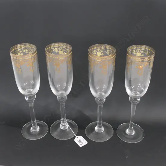 FOUR GILT EDGED FLUTES