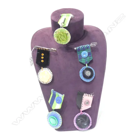 FIVE AVANT GARDE VINTAGE BUTTON/FABRIC BROOCHES