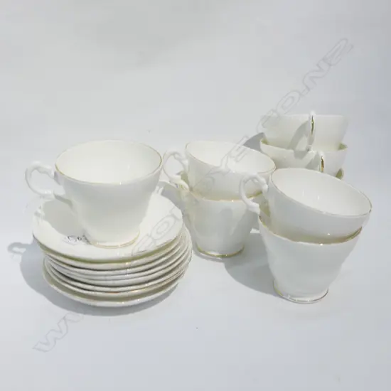 8 'REGENCY' BREAKFAST CUPS AND SAUCERS