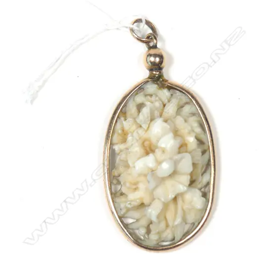 c1900 FLORAL CARVED IVORY PENDANT ROLLED GOLD FRAME