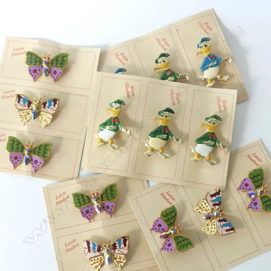 BAG OF ASST VINTAGE DONALD DUCK BROOCHES