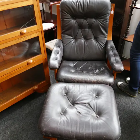 60'S MODERNIST LEATHER CHAIR AND OTTOMAN