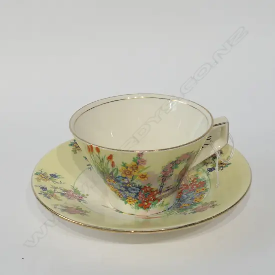 ROYAL WINTON IVORY CUP AND SAUCER