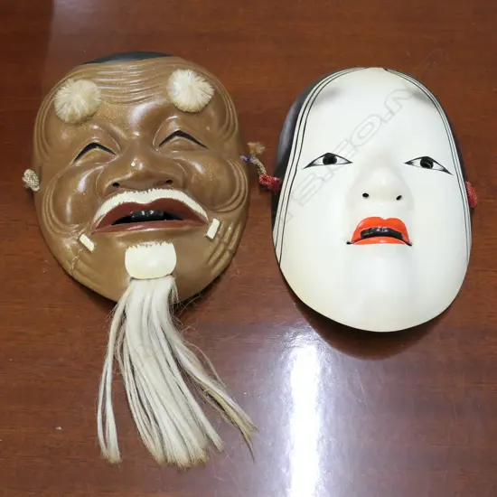 TWO JAPANESE CERAMIC HANGING WALL MASKS H. 170MM