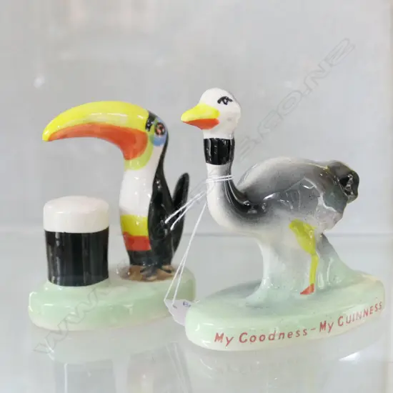 PAIR OF GUINESS FIGURINES