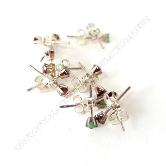 SILVER EMERALD AND GARNET STUDS 7prs