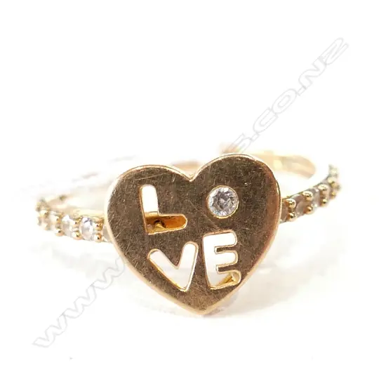 18K (700) 'LOVE' RING W DIAMOND1.92GMS