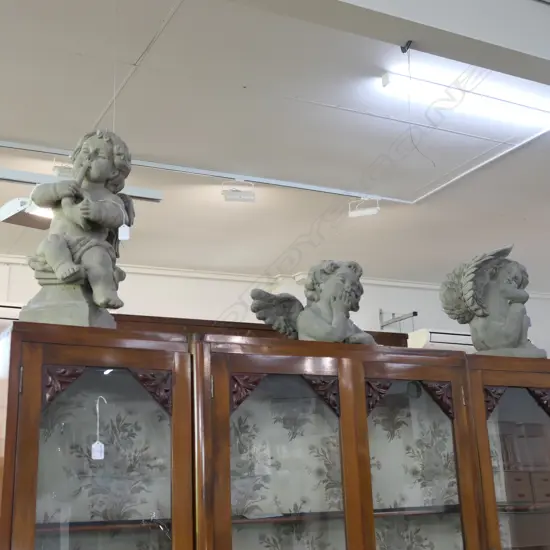 3 CONCRETE GARDEN ORNAMENTS IN THE STYLE OF CHERUBS 