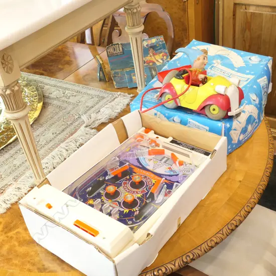 A WORKING BATTERY OPERATED BORD GAME & TOY CAR