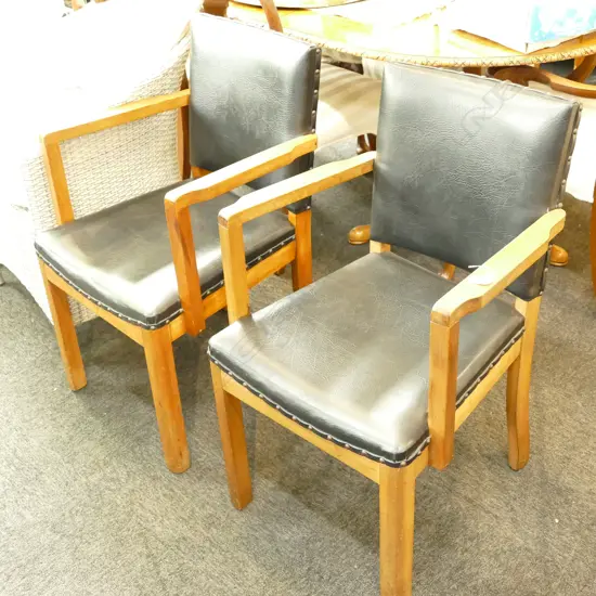 PR 1940'S BLACK VYNAL UPHOLSTERED ARMCHAIRS