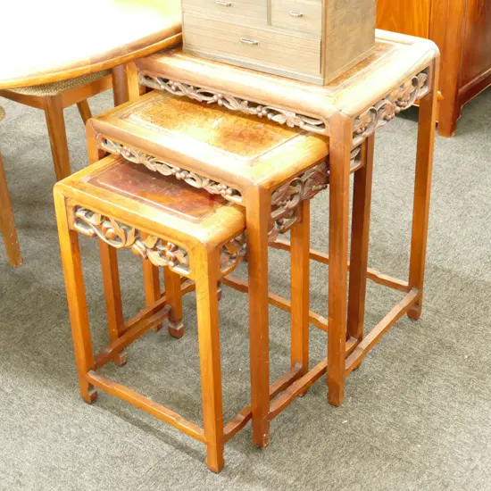 NEST OF 3 CHINESE CARVED TABLES