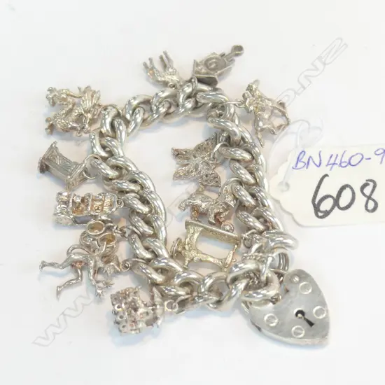 HEAVY QUALITY SILVER CHARM BRACELET 'ASJ'. 83gms