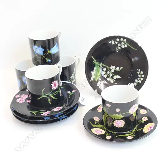 5 TIFFANY CUPS AND SAUCERS