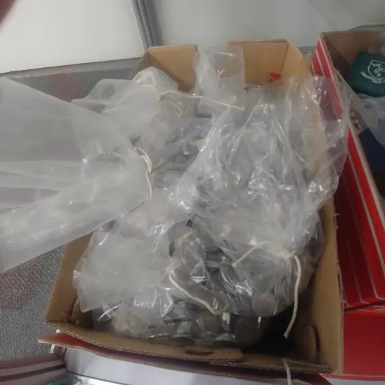 BOX OF INTERNATIONAL COINS