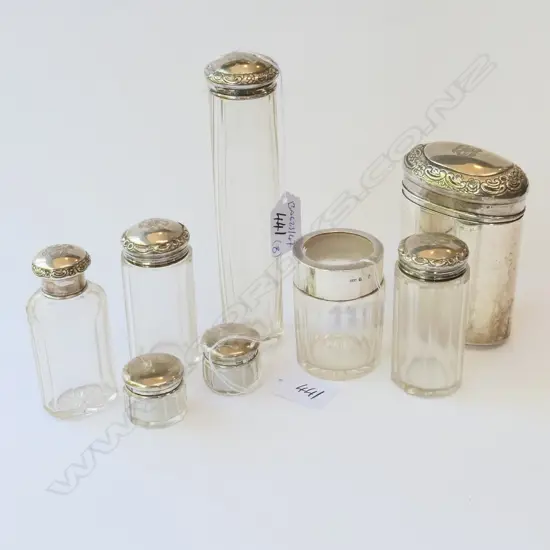 7 STG TOPPED VANITY BOTTLES BOXES ETC