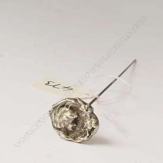 Art nouveau hatpin with sterling silver top of Woman and Flowers