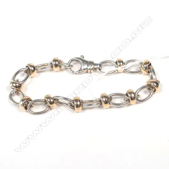 9CT GOLD AND SILVER BRACELET