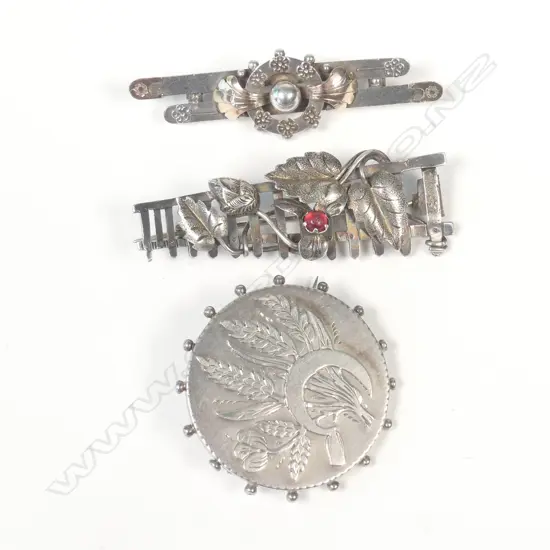 THREE VICTORIAN SILVER BROOCHES