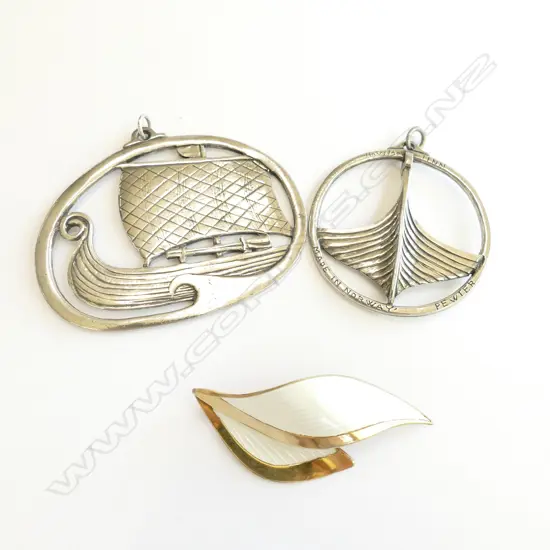 TWO NORWEGIAN PEWTER PENDANTS AND A SILVER GILT BROOCH