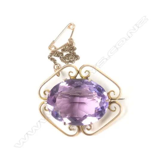 9CT GOLD AND AMETHYST BROOCH