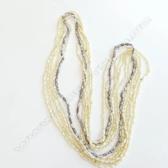 6 STRANDS OF FRESH WATER PEARLS.