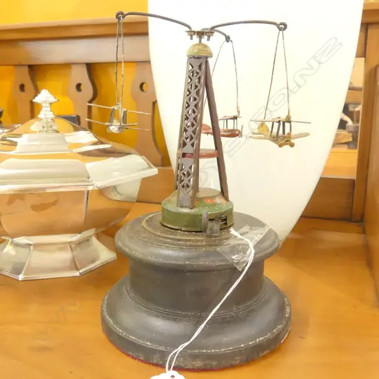 VINTAGE METAL CARA-SOLE TOY