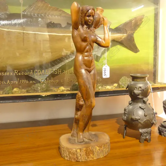 CARVED WOODEN FIGURE OF A WOMAN WITH URN H 420 MM