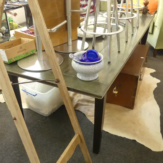 An oak French provincial style dining table