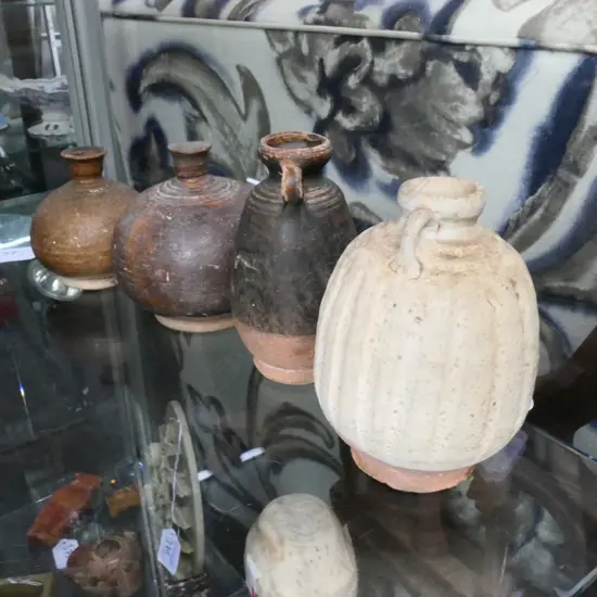 4 SMALL POTTERY VESSELS LARGEST 120MM H 18901