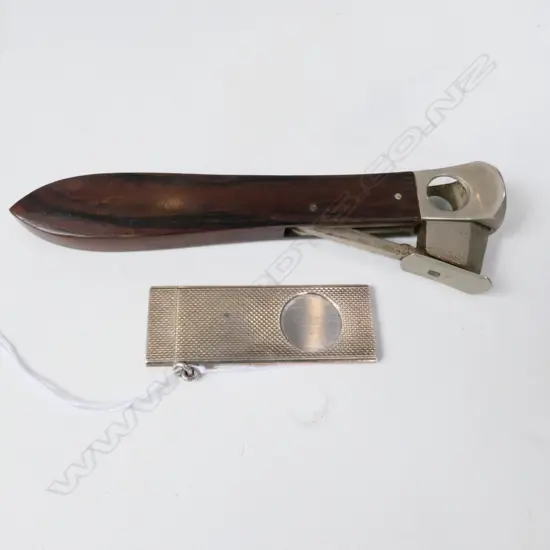A STG SILVER CIGAR CUTTER + ONE OTHER